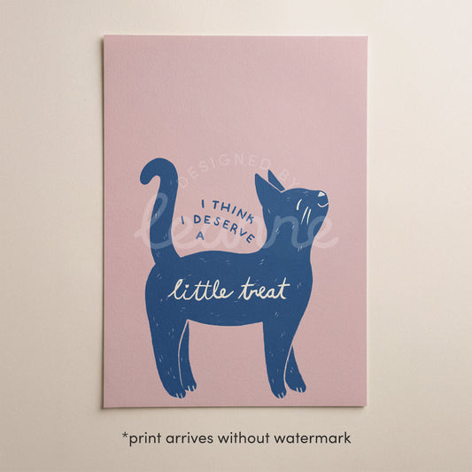 Cat print “I think I deserve a little treat” on pink background, blue cat
