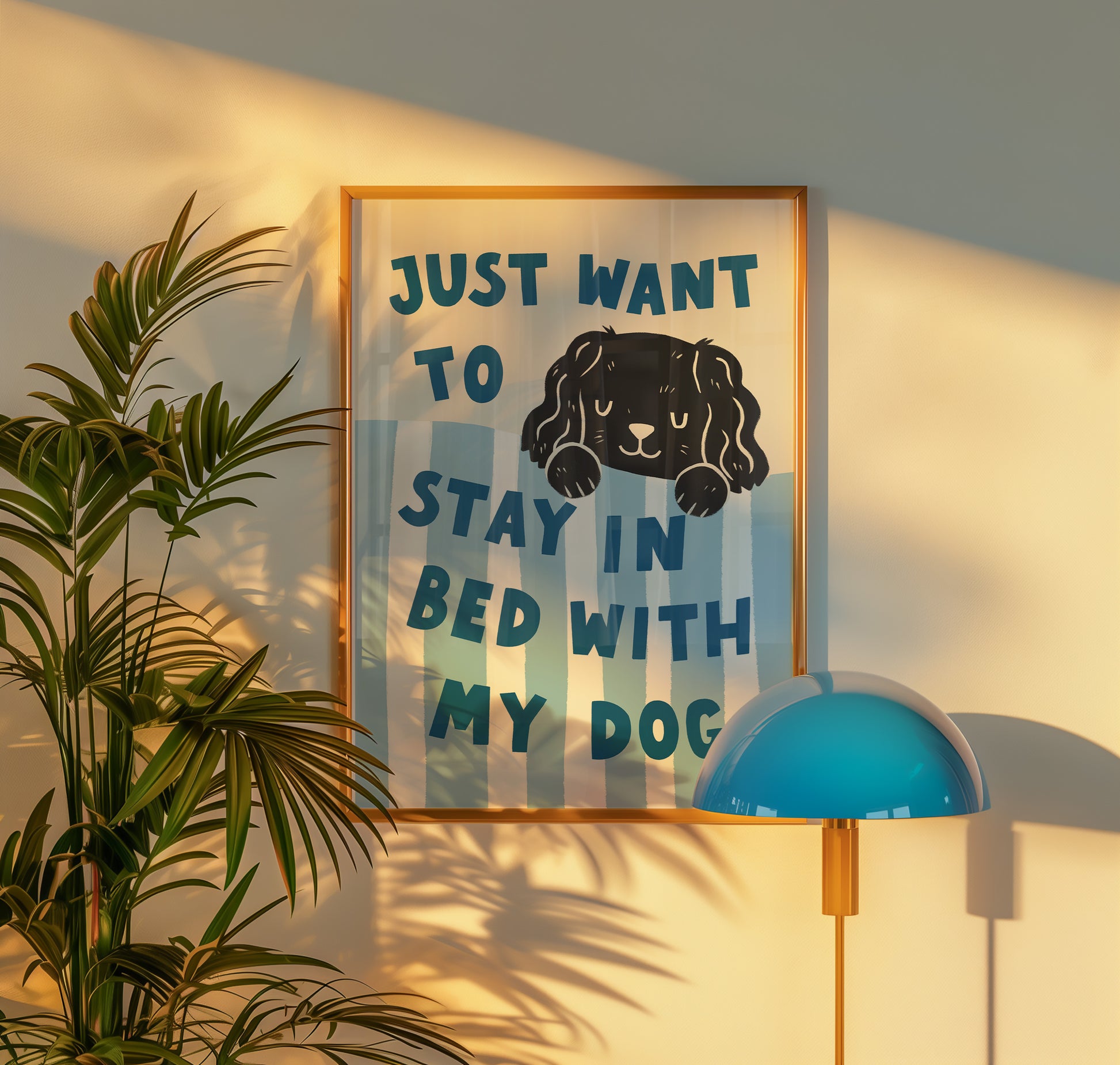 Framed “Just Want to Stay in Bed with My Dog” print in blue-and-white stripes