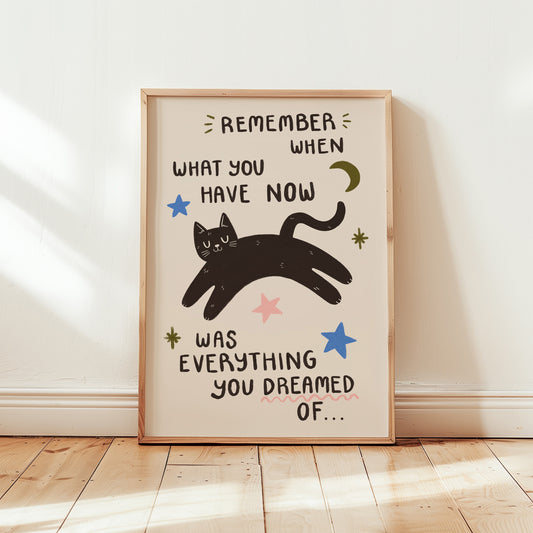 Full light beige cat motivation wall print with black cat, stars, and quote text