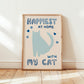 Happiest at Home print with blue cat, dark blue hearts, “with my cat” in wood frame