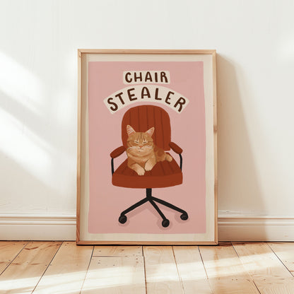Cat office chair artwork print with orange tabby cat and 'CHAIR STEALER' text on pink
