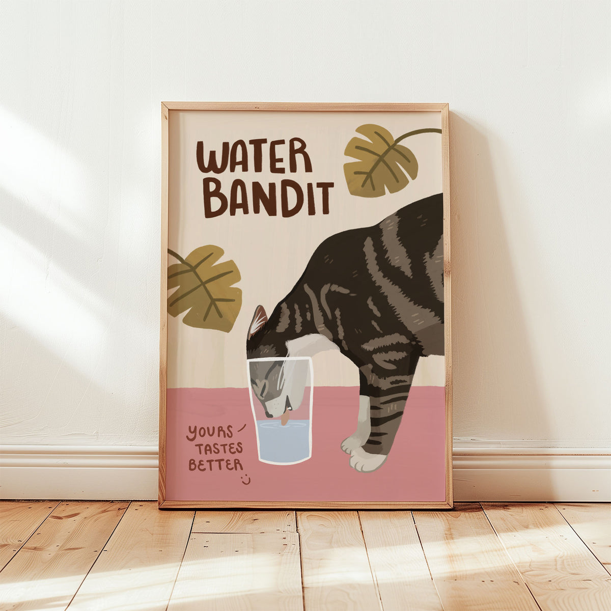 Unframed cat art print featuring “WATER BANDIT,” tabby cat drinking from a water glass