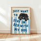 Framed “Just Want to Stay in Bed with My Dog” print in blue-and-white stripes