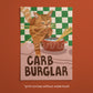 Cat wall art print with orange tabby burglar cat carrying food bowl, “CARB BURGLAR”