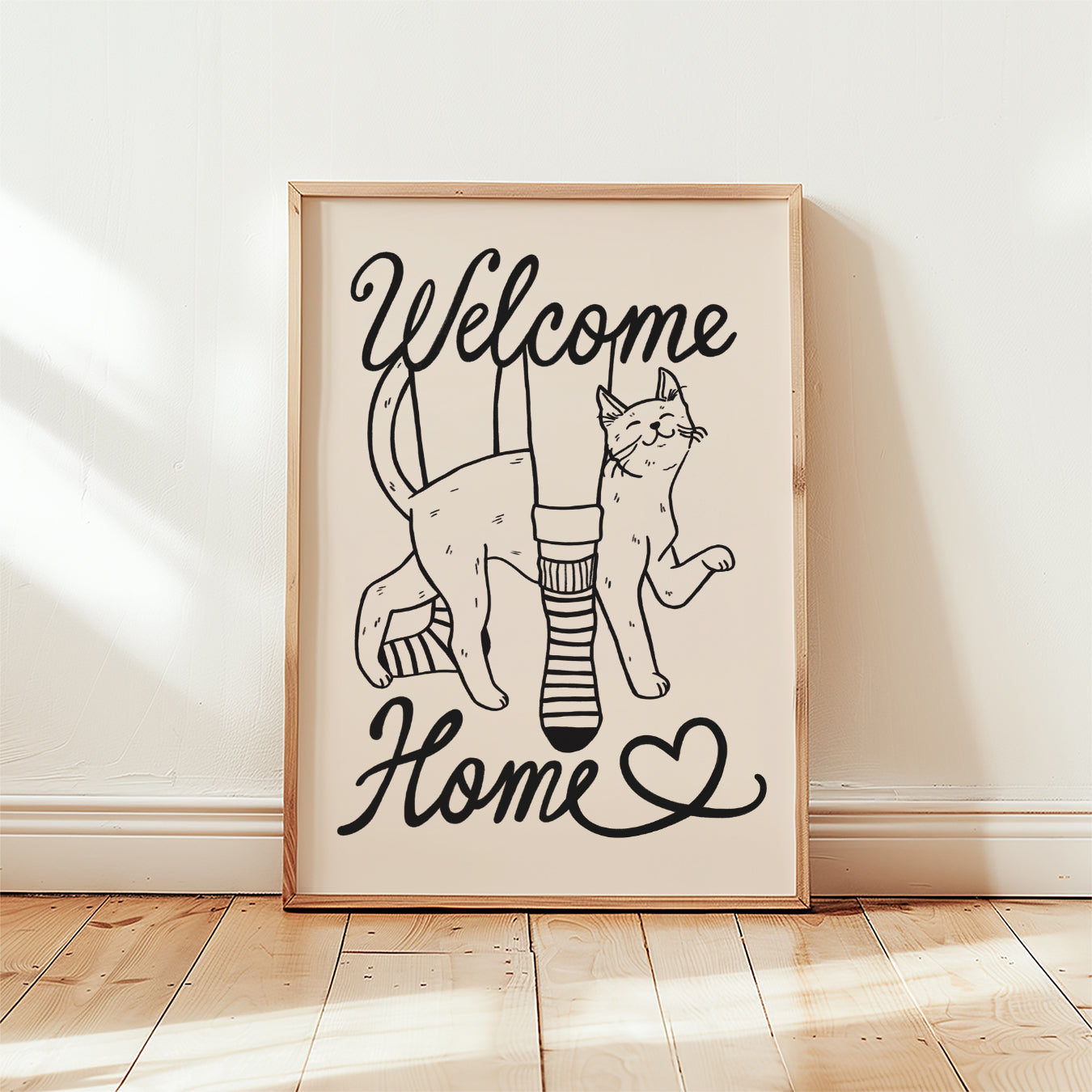 Framed Welcome Home cat lover print with two cats, black line art and heart symbol