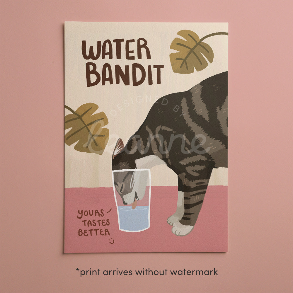 Unframed cat art print with “WATER BANDIT” text, tabby cat drinking from a water glass
