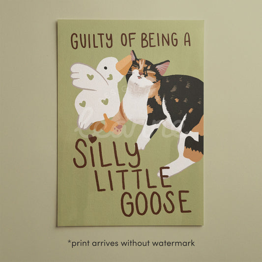 Unframed goose and cat illustration print with “Silly Little Goose” on light green