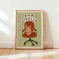 Cat office chair artwork print with orange tabby cat and 'CHAIR STEALER' text on green