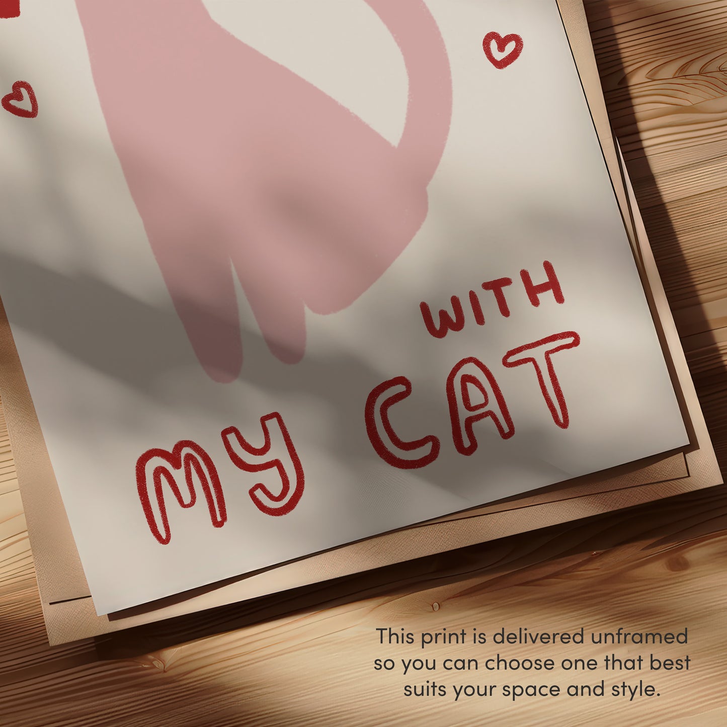 Close-up of “with my CAT” text on Happiest at Home print with pink cat illustration