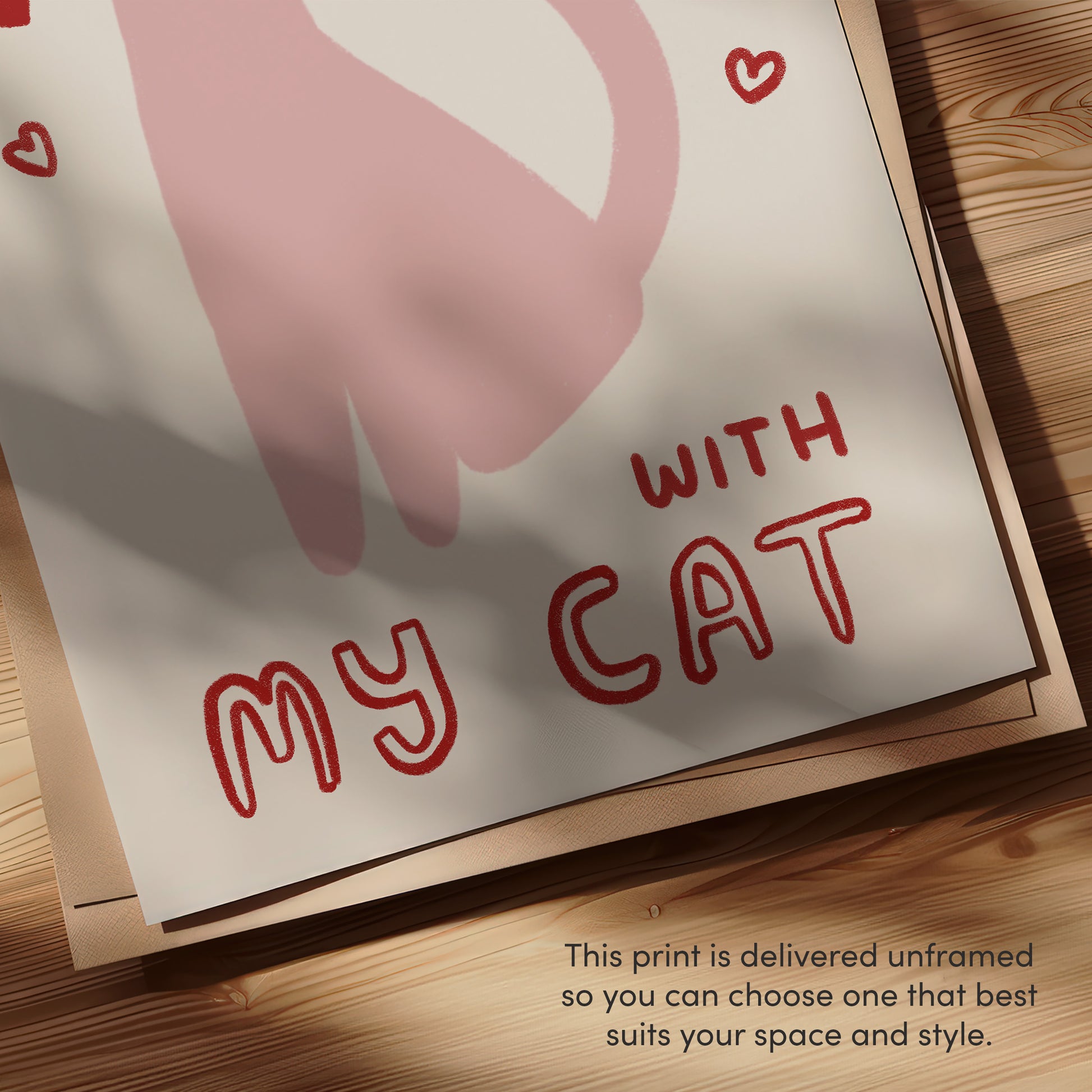 Close-up of “with my CAT” text on Happiest at Home print with pink cat illustration