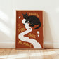 Cat bathroom print: black cat on toilet paper, orange background, framed border