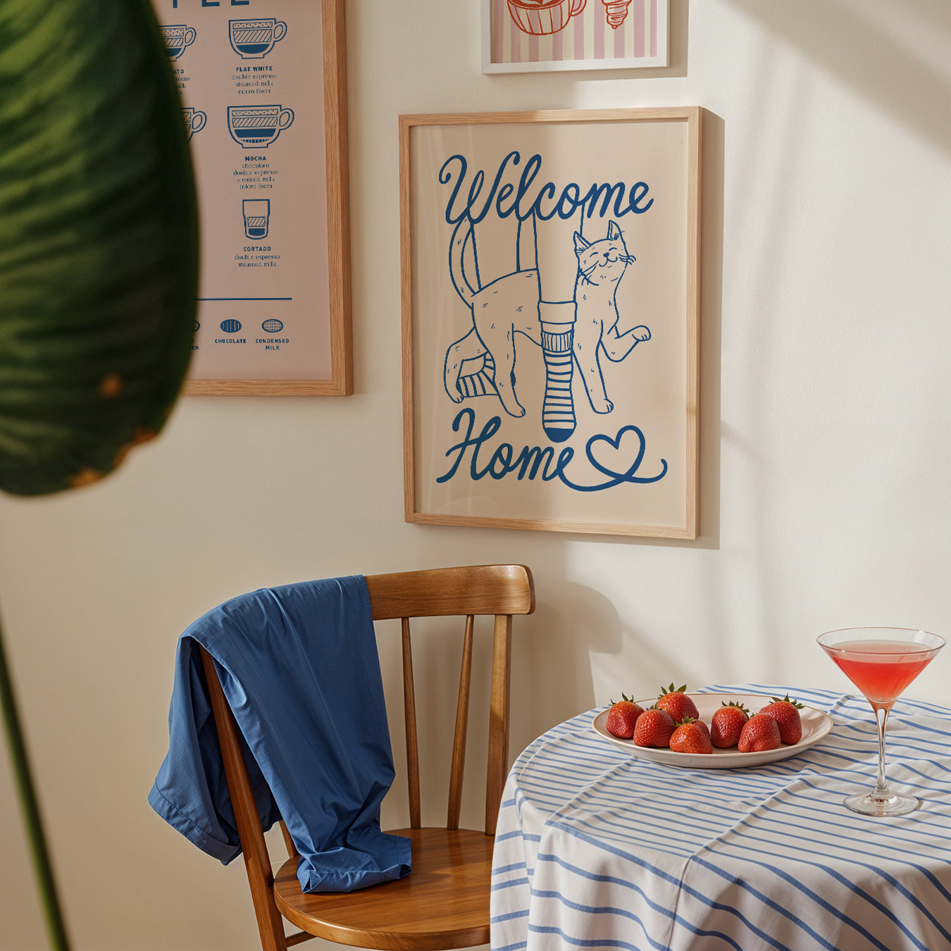 Framed cat lover print: 'Welcome Home' with two cats, blue ink on beige background
