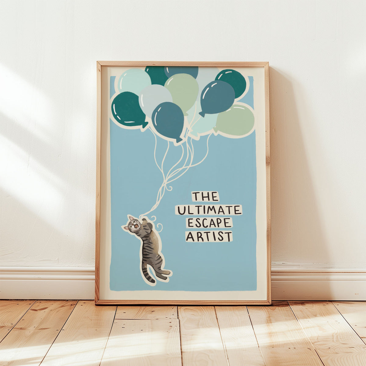 Blue-toned cat print wall art with balloon cluster and a gray cat illustration, text included.