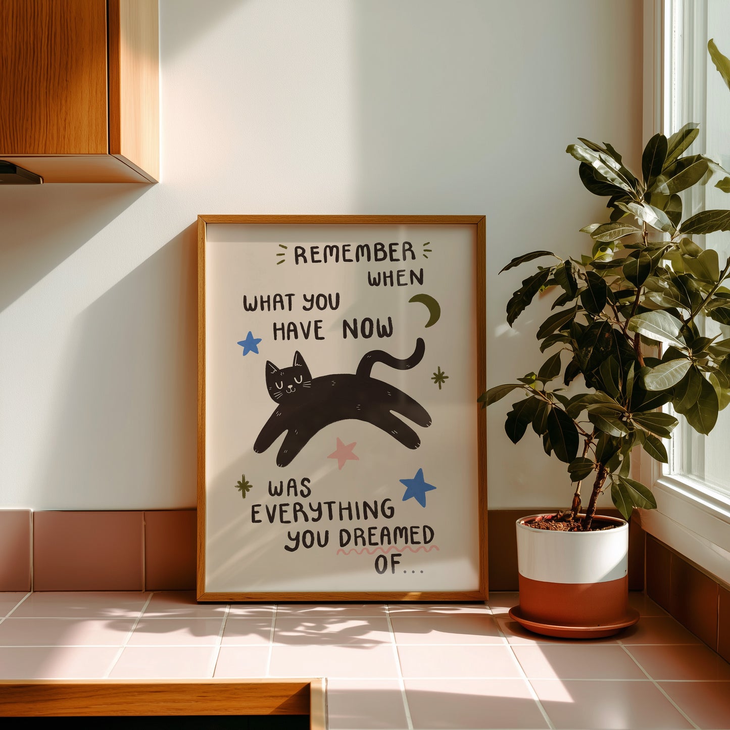 Cat motivation wall print on white background with black cat, stars, and quote text