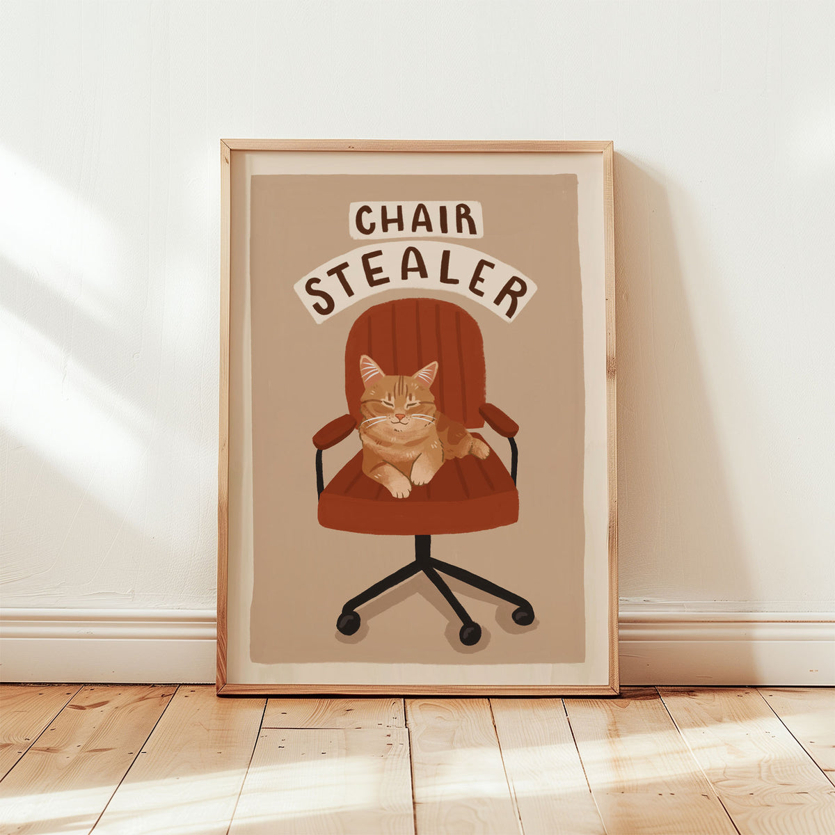 Cat office chair artwork print with orange tabby cat and 'CHAIR STEALER' text on beige