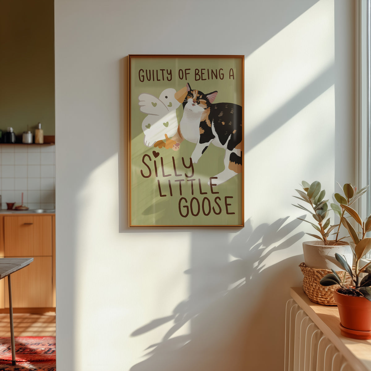 Unframed goose and cat illustration print with “Silly Little Goose” on green paper