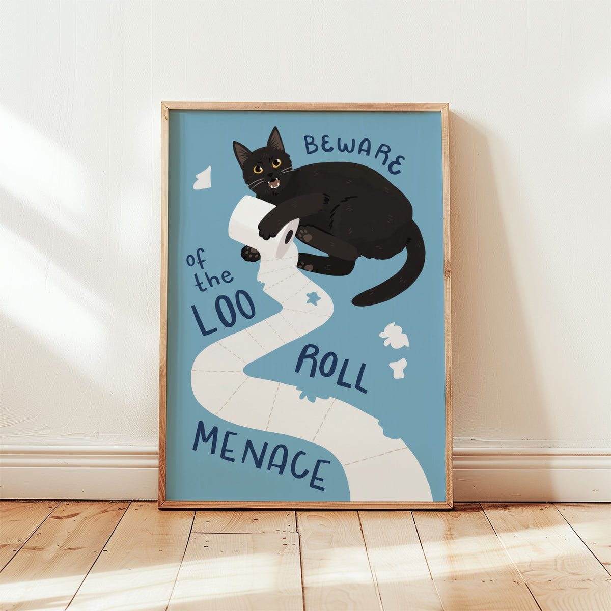 Cat bathroom print: black cat on toilet paper, blue background, framed border