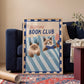 Bedtime Book Club cat print, unframed; blue striped bedding with two reading cats