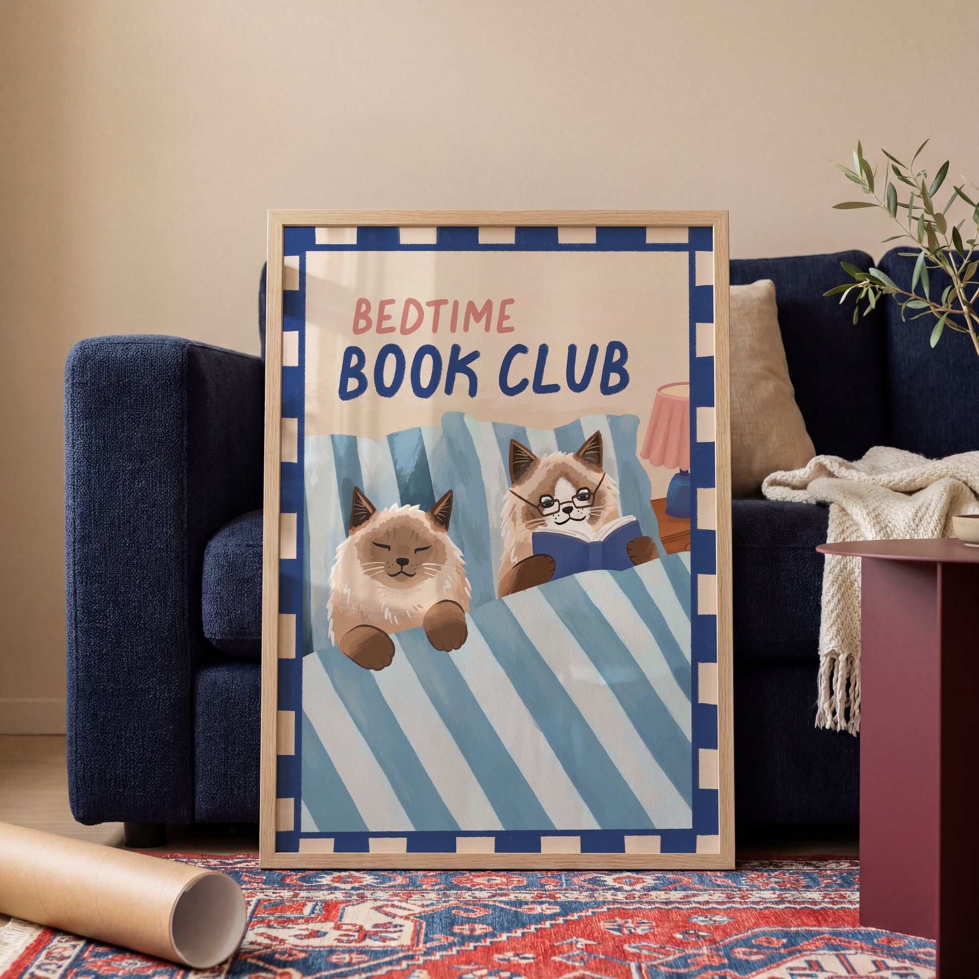 Bedtime Book Club cat print, unframed; blue striped bedding with two reading cats