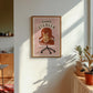 Framed cat office chair artwork print with orange tabby cat and 'CHAIR STEALER' text