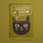 Unframed cat print wall art with black cat face, star eyes, and “I Believe in You” on green background