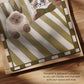 Bedtime Book Club cat print close-up, unframed; green striped bedding with cat reading