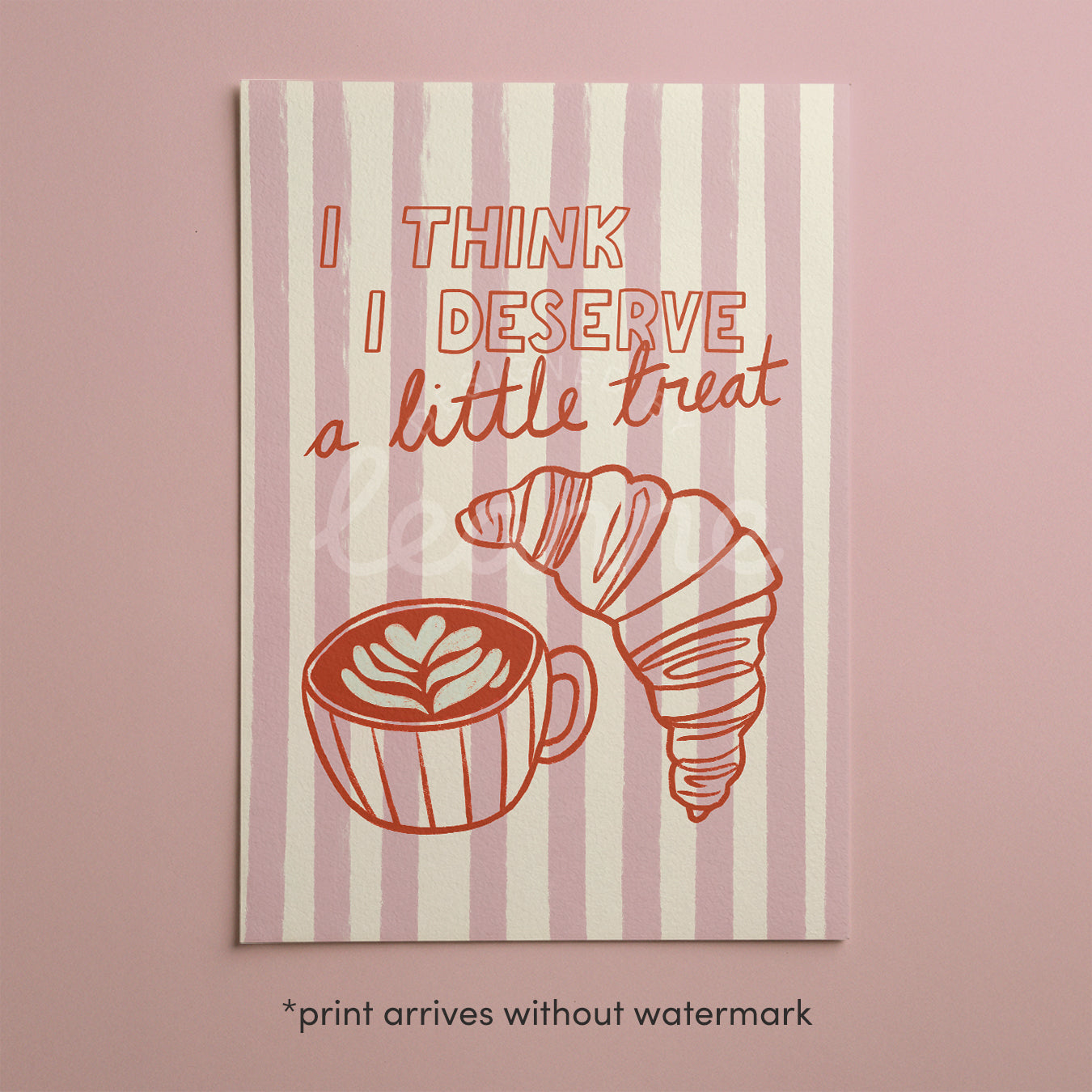 Framed print with pink-and-cream stripes, “I think I deserve a little treat” text and croissant