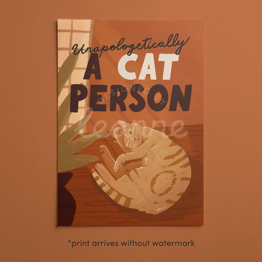 Unapologetically a Cat Person art print, orange with cat curled up and large lettering