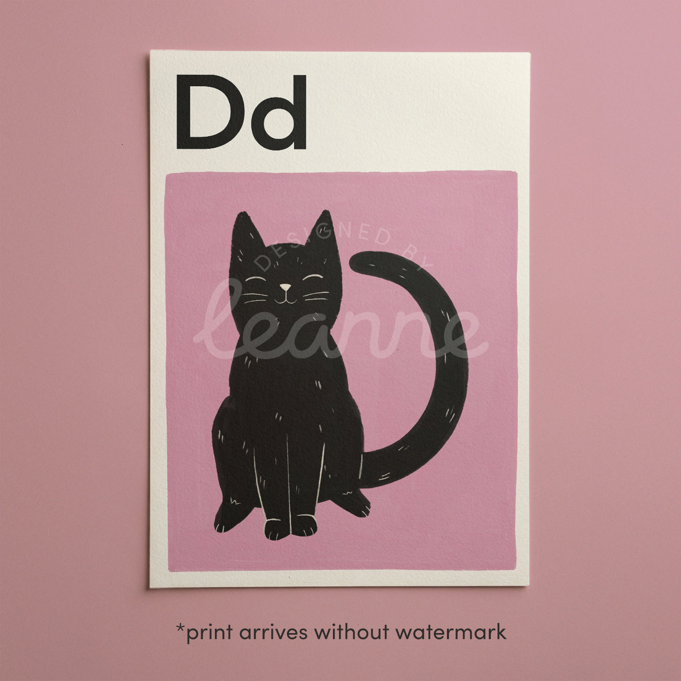 Pink cat alphabet print letter Dd with black cat silhouette in frame