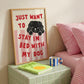 Framed “Just Want to Stay in Bed with My Dog” print with pink-and-white stripes